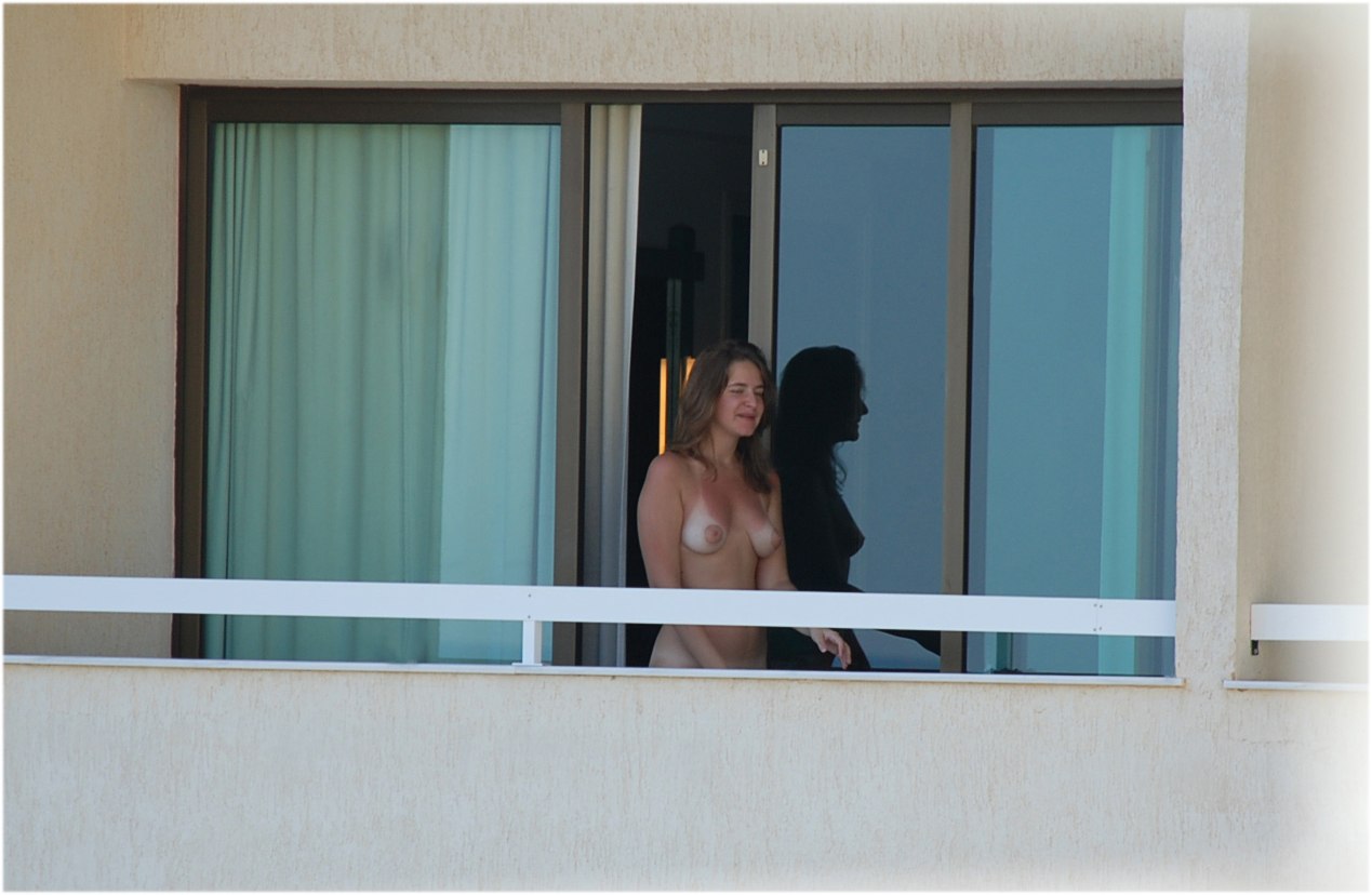 Mature gets fucked hotel window photo